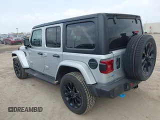 2023 Jeep Wrangler Sahara with VIN 1C4JJXP62PW627455, listed as a IAAI auction lot 42115137 with 62,143 mi miles and . Bid and sale history available at carsss.com. Image 3.