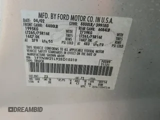 2002 Ford F-250 XL with VIN 1FTNW21L92ED10310, listed as a Copart auction lot 59132935 with 217,885 mi miles and Salvage title. Bid and sale history available at DreamBid. Image 12.