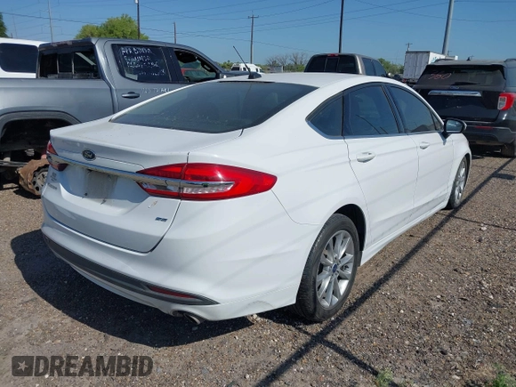 2017 Ford Fusion SE z VIN 3FA6P0H7XHR144020, wystawiony jako IAAI lot #41984688 z przebiegiem 189 326 mil mil oraz . Historia ofert i sprzedaży dostępna na DreamBid. Obrazek 4.