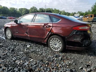 2016 Ford Fusion SE Hybrid z VIN 3FA6P0LU5GR377735, wystawiony jako Copart lot #58791955 z przebiegiem 135 798 mil mil oraz Szkoda całkowita • Salvage title. Historia ofert i sprzedaży dostępna na DreamBid. Obrazek 2.