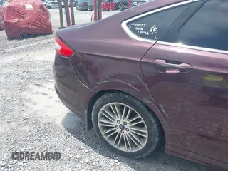 2013 Ford Fusion SE z VIN 3FA6P0HR5DR198109, wystawiony jako IAAI lot #42459993 z przebiegiem 119 372 mil mil oraz . Historia ofert i sprzedaży dostępna na DreamBid. Obrazek 15.
