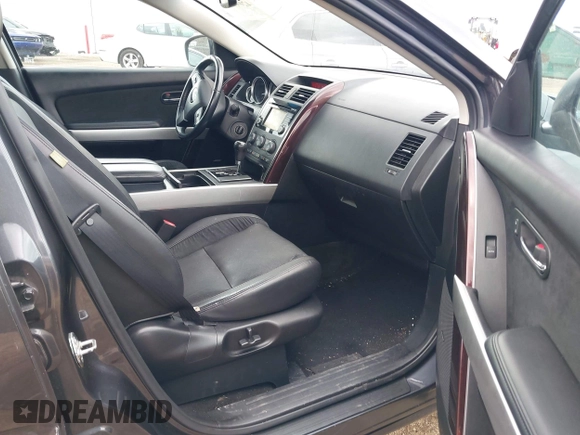 2015 Mazda CX-9 Grand Touring with VIN JM3TB3DV1F0465966, listed as a IAAI auction lot 42049749 with 74,470 mi miles and . Bid and sale history available at DreamBid. Image 5.