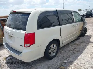 2013 Dodge Grand Caravan SXT with VIN 2C4RDGCG5DR524074, listed as a IAAI auction lot 37312051 with Not Provided miles and . Bid and sale history available at DreamBid. Image 4.