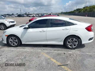 2016 Honda Civic Sedan LX with VIN 19XFC2F59GE068847, listed as a IAAI auction lot 42051510 with 113,450 mi miles. Bid and sale history available at carsss.com. Image 14.