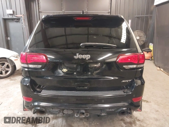 2017 Jeep Grand Cherokee SRT with VIN 1C4RJFDJ9HC819478, listed as a IAAI auction lot 41325490 with 63,551 mi miles. Bid and sale history available at carsss.com. Image 16.