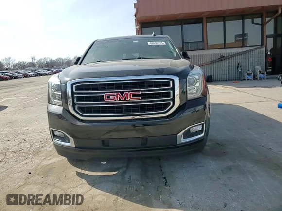 2017 GMC Yukon SLT with VIN 1GKS2BKC1HR217445, listed as a Copart auction lot 48499215 with 104,526 mi miles and Salvage Title. Bid and sale history available at carsss.com. Image 12.