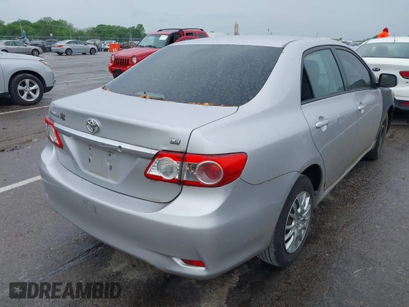 2011 Toyota Corolla L with VIN 2T1BU4EE5BC563739, listed as a IAAI auction lot 42188983 with 192,801 mi miles and . Bid and sale history available at carsss.com. Image 4.