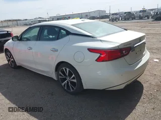 2018 Nissan Maxima SL z VIN 1N4AA6AP6JC366308, wystawiony jako IAAI lot #41823787 z przebiegiem 94 020 mil mil oraz . Historia ofert i sprzedaży dostępna na DreamBid. Obrazek 3.