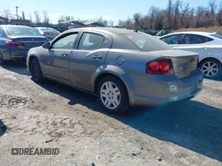 2013 Dodge Avenger with VIN 1C3CDZAB8DN531045, listed as a IAAI auction lot 41885513 with 246,559 mi miles and . Bid and sale history available at DreamBid. Image 3.