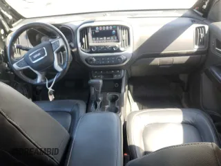2018 GMC Canyon 4WD SLT with VIN 1GTG6DEN9J1216871, listed as a Copart auction lot 50034345 with 64,868 mi miles and Salvage Title. Bid and sale history available at carsss.com. Image 8.