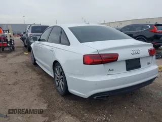 2018 Audi A6 Premium Plus z VIN WAUG3AFC7JN041708, wystawiony jako IAAI lot #41670779 z przebiegiem 91 753 mil mil oraz . Historia ofert i sprzedaży dostępna na DreamBid. Obrazek 3.