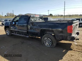 2017 Chevrolet Silverado 3500HD High Country with VIN 1GC4K1EY7HF212936, listed as a Copart auction lot 52511925 with 201,569 mi miles and Salvage Title. Bid and sale history available at DreamBid. Image 2.