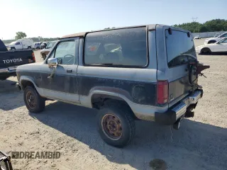 1984 Ford Bronco with VIN 1FMCU14S6EUA81956, listed as a Copart auction lot 53947335 with 2,868 mi miles and Clean title. Bid and sale history available at DreamBid. Image 2.