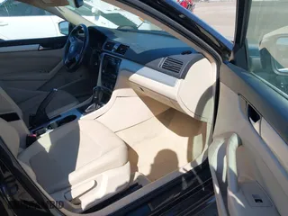 2013 Volkswagen Passat SE w/Sunroof with VIN 1VWBH7A36DC020984, listed as a IAAI auction lot 41883902 with 169,916 mi miles. Bid and sale history available at carsss.com. Image 5.