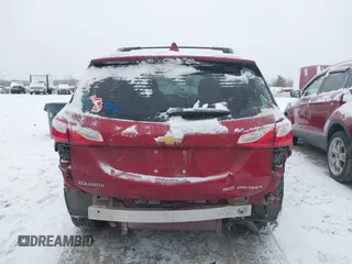 2021 Chevrolet Equinox Premier z VIN 2GNAXXEV4M6105996, wystawiony jako IAAI lot #41402065 z przebiegiem 51 083 mil mil oraz . Historia ofert i sprzedaży dostępna na DreamBid. Obrazek 17.