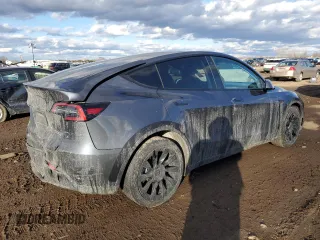 2022 Tesla Model Y Long Range with VIN 7SAYGDEE7NF386082, listed as a Copart auction lot 47191625 with 73,634 mi miles and Salvage Title. Bid and sale history available at carsss.com. Image 3.