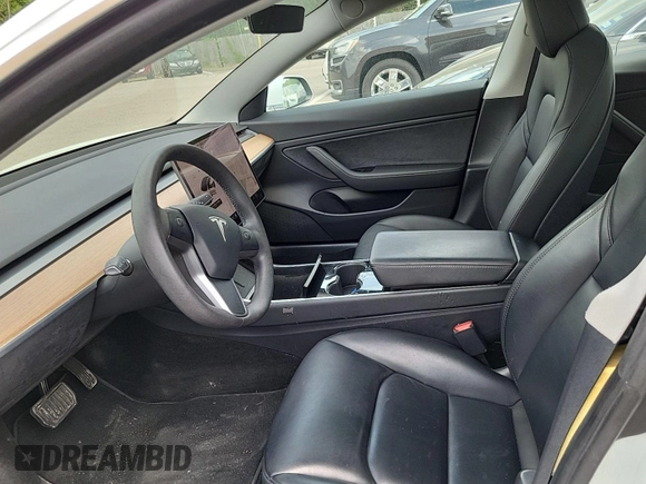 2020 Tesla Model 3 Long Range with VIN 5YJ3E1EB9LF795103, listed as a IAAI auction lot 42248664 with 35,627 mi miles and . Bid and sale history available at DreamBid. Image 1.
