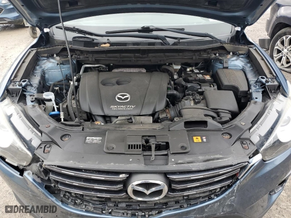 2016 Mazda CX-5 Touring with VIN JM3KE4CY4G0778032, listed as a Copart auction lot 52769065 with 81,443 mi miles and Salvage Title. Bid and sale history available at carsss.com. Image 12.