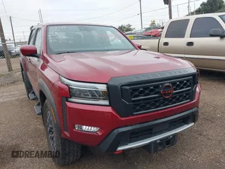 2023 Nissan Frontier Pro-4X z VIN 1N6ED1EK4PN652544, wystawiony jako IAAI lot #41309698 z przebiegiem 26 173 mil mil oraz . Historia ofert i sprzedaży dostępna na DreamBid. Obrazek 1.