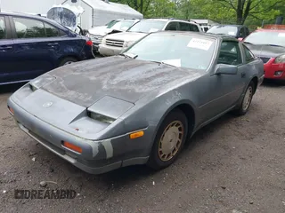 1987 Nissan 300ZX z VIN JN1HZ14S6HX217908, wystawiony jako IAAI lot #42271417 z przebiegiem 195 466 mil mil oraz . Historia ofert i sprzedaży dostępna na DreamBid. Obrazek 2.