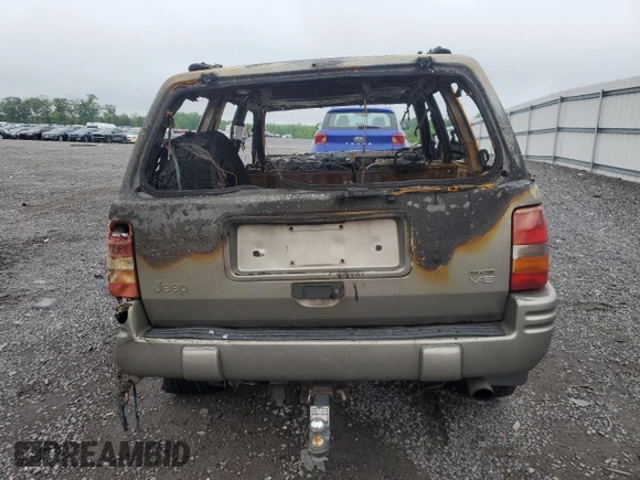 1998 Jeep Grand Cherokee Limited z VIN 1J4GZ88ZXWC255195, wystawiony jako Copart lot #55817705 z przebiegiem Nie podano mil oraz Nie do naprawy • Non repairable. Historia ofert i sprzedaży dostępna na DreamBid. Obrazek 6.