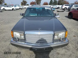 1990 Mercedes-Benz 560 with VIN WDBCA39E3LA553622, listed as a Copart auction lot 81530904 with 142,614 mi miles and Clean Title. Bid and sale history available at DreamBid. Image 5.