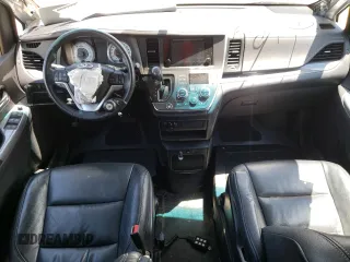 2015 Toyota Sienna SE with VIN 5TDXK3DCXFS580975, listed as a Copart auction lot 56309505 with 154,073 mi miles and Salvage title. Bid and sale history available at DreamBid. Image 8.