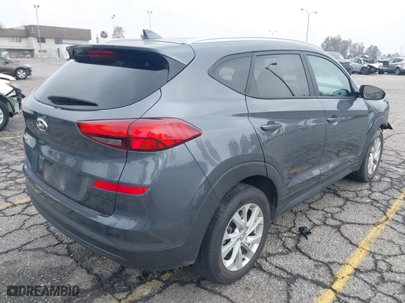 2019 Hyundai Tucson Value with VIN KM8J33A49KU071977, listed as a IAAI auction lot 41515460 with 24,701 mi miles. Bid and sale history available at carsss.com. Image 4.