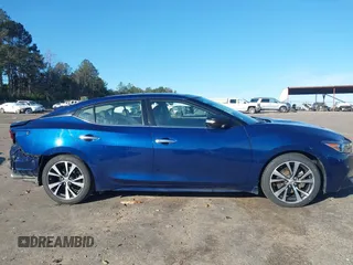 2017 Nissan Maxima SV with VIN 1N4AA6AP9HC435471, listed as a IAAI auction lot 41572210 with 112,159 mi miles and . Bid and sale history available at DreamBid. Image 14.