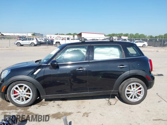 2015 MINI Countryman with VIN WMWZB3C54FWM33074, listed as a IAAI auction lot 42094992 with 86,704 mi miles and . Bid and sale history available at DreamBid. Image 15.