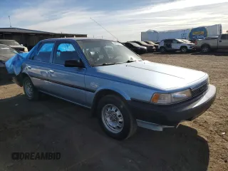 1990 Toyota Camry z VIN 4T1SV24E0LU137556, wystawiony jako Copart lot #84628404 z przebiegiem 247 203 mil mil oraz Czysty tytuł • Clean title. Historia ofert i sprzedaży dostępna na DreamBid. Obrazek 4.