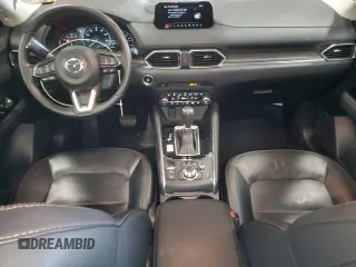 2020 Mazda CX-5 Grand Touring with VIN JM3KFBDM9L0760861, listed as a Copart auction lot 60977275 with 58,608 mi miles and Salvage title. Bid and sale history available at DreamBid. Image 8.