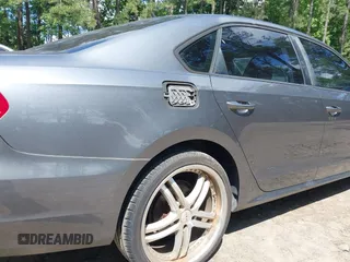 2014 Volkswagen Passat S with VIN 1VWAP7A37EC018693, listed as a IAAI auction lot 42463719 with 143,105 mi miles and . Bid and sale history available at DreamBid. Image 14.