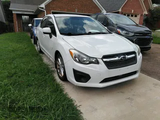 2014 Subaru Impreza Premium with VIN JF1GJAC68EH007312, listed as a IAAI auction lot 42717142 with 111,951 mi miles and . Bid and sale history available at DreamBid. Image 1.
