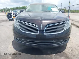 2014 Lincoln MKS with VIN 1LNHL9DK0EG605429, listed as a IAAI auction lot 42809745 with 127,038 mi miles and . Bid and sale history available at DreamBid. Image 6.