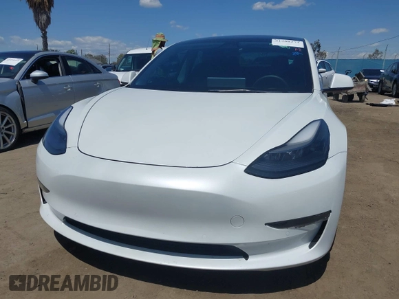 2022 Tesla Model 3 Long Range with VIN 5YJ3E1EB1NF289719, listed as a IAAI auction lot 41968273 with 73,368 mi miles and . Bid and sale history available at DreamBid. Image 13.