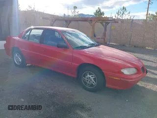 1996 Pontiac Grand Am SE with VIN 1G2NE52T7TC851196, listed as a IAAI auction lot 41700021 with 250,393 mi miles. Bid and sale history available at carsss.com. Image 1.