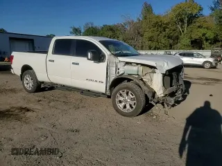 2021 Nissan Titan SV z VIN 1N6AA1FB8MN504530, wystawiony jako Copart lot #80914794 z przebiegiem 103 771 mil mil oraz Szkoda całkowita • Salvage title. Historia ofert i sprzedaży dostępna na DreamBid. Obrazek 14.