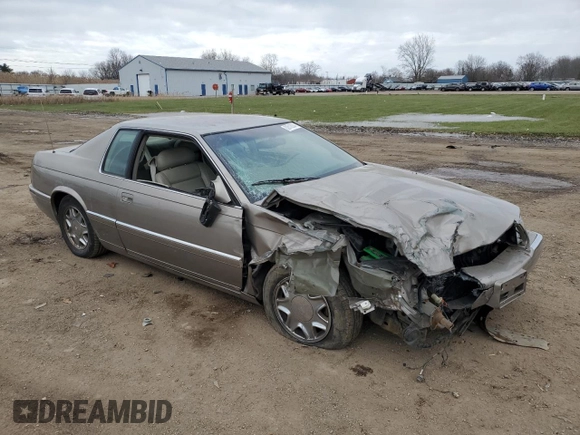 2000 Cadillac Eldorado with VIN 1G6EL12Y5YU166723, listed as a Copart auction lot 82612034 with 80,839 mi miles and Salvage title. Bid and sale history available at DreamBid. Image 4.