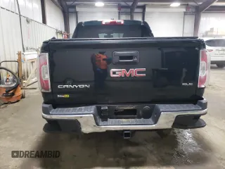2015 GMC Canyon 4WD SLE with VIN 1GTG6BE38F1258880, listed as a Copart auction lot 57887664 with 142,346 mi miles and Salvage Title. Bid and sale history available at carsss.com. Image 6.