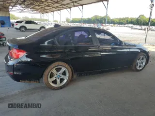 2015 BMW 3 Series 328i with VIN WBA3A5G51FNS87379, listed as a Copart auction lot 57752165 with 56,802 mi miles and Salvage title. Bid and sale history available at DreamBid. Image 3.