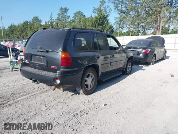 2004 GMC Envoy SLE with VIN 1GKDS13S342117178, listed as a IAAI auction lot 42164611 with 181,287 mi miles and . Bid and sale history available at DreamBid. Image 4.
