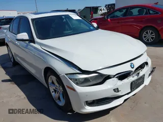 2015 BMW 3 Series 320i with VIN WBA3B1C53FK138341, listed as a IAAI auction lot 41757490 with 125,280 mi miles. Bid and sale history available at carsss.com. Image 1.