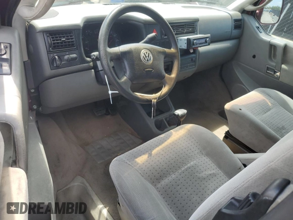 1999 Volkswagen EuroVan с VIN WV2MH2703XH045037, выставлен на аукционе Copart как лот 57109265 с пробегом 265 855 миль миль и Списание • Salvage title. История ставок и продаж доступна на DreamBid. Изображение 8.