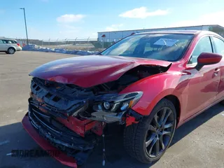 2016 Mazda 6 i Grand Touring with VIN JM1GJ1W51G1443203, listed as a IAAI auction lot 41247354 with 144,840 mi miles. Bid and sale history available at carsss.com. Image 6.