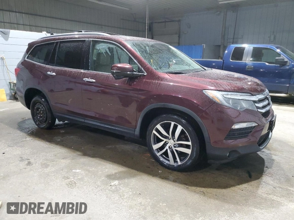 2017 Honda Pilot Touring with VIN 5FNYF6H99HB024088, listed as a Copart auction lot 88650165 with 123,964 mi miles and Salvage Title. Bid and sale history available at DreamBid. Image 4.