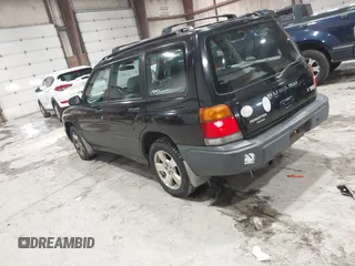 1998 Subaru Forester L with VIN JF1SF6353WH776091, listed as a IAAI auction lot 41573799 with 170,851 mi miles. Bid and sale history available at carsss.com. Image 3.