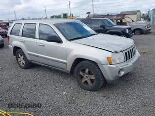 2007 Jeep Grand Cherokee Laredo z VIN 1J8GR48K57C605912, wystawiony jako IAAI lot #42323050 z przebiegiem 210 615 mil mil oraz . Historia ofert i sprzedaży dostępna na DreamBid. Obrazek 1.