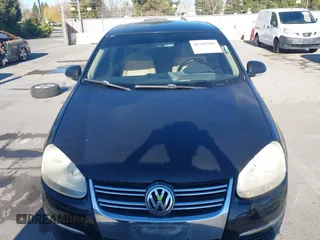 2008 Volkswagen Jetta SE z VIN 3VWRZ71K18M166457, wystawiony jako IAAI lot #41392289 z przebiegiem 244 330 mil mil oraz . Historia ofert i sprzedaży dostępna na DreamBid. Obrazek 6.