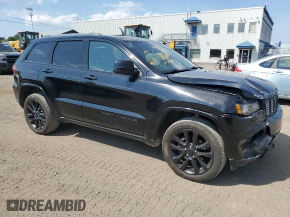2019 Jeep Grand Cherokee Altitude with VIN 1C4RJFAG5KC813144, listed as a Copart auction lot 62295595 with 140,986 mi miles and Salvage title. Bid and sale history available at DreamBid. Image 4.